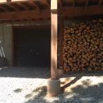 Basement access is a garage style roll up door.  Basement is unfinished and does not qualify as a garage.