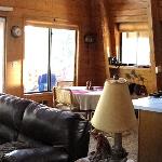 This panorama gives a good view of the living, dining, and kitchen areas.
